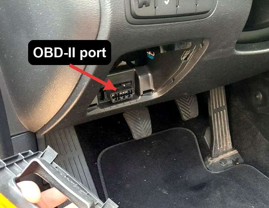 OBD-II port location on a Kia Cee'd (JD, 2012-2018), low in the driver's footwell behind a removable trim cover