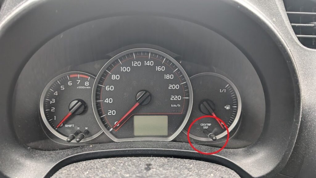 Toyota Yaris ODO TRIP reset button instrument cluster location